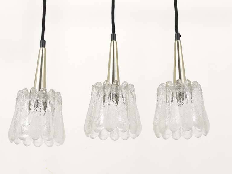 Set of three glass pendants by Carl Fagerlund for Orrefors, Sweden, 1960s.