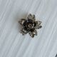 Light metal flower candlestick