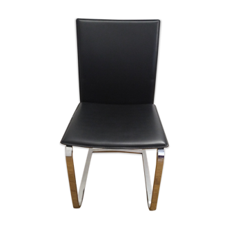 Dining chair in black leather and metal