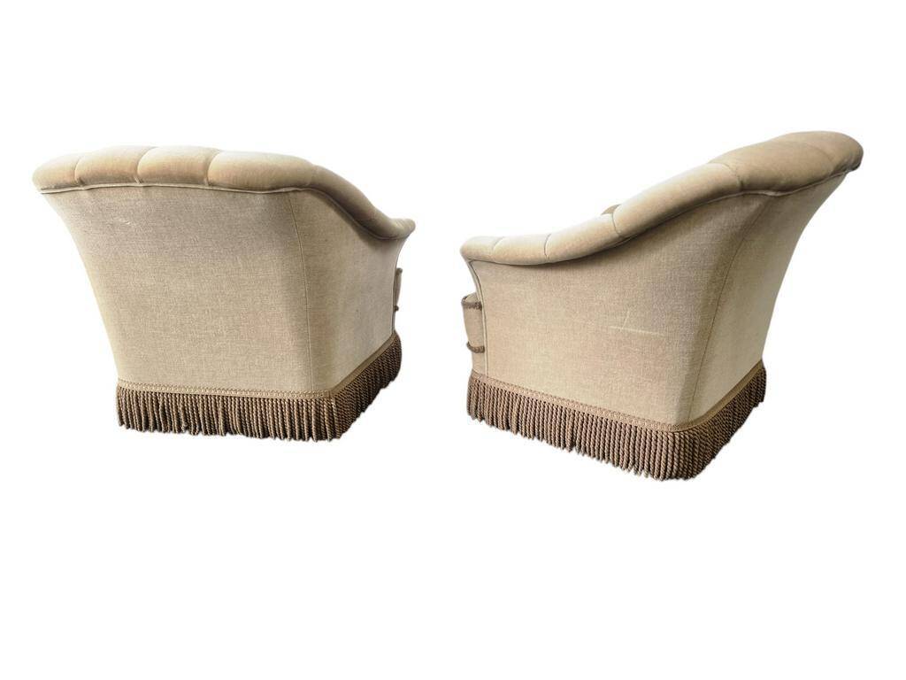 Set of 2 vintage ecru armchairs with fringes.