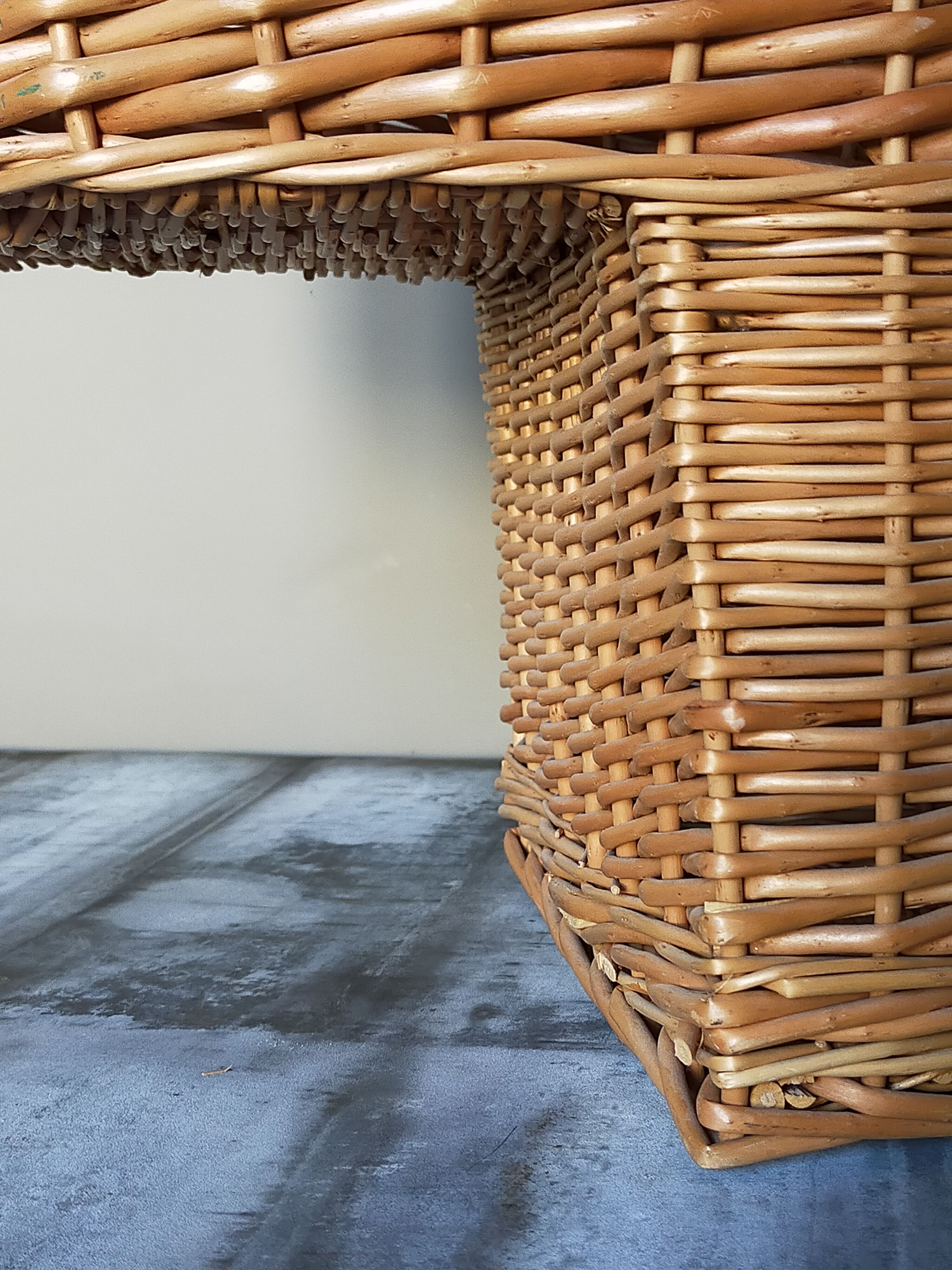 Asymmetrical woven rattan basket