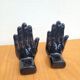 Pair of vintage black ceramic hand bookends