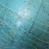 Luminous world map in tripod glass