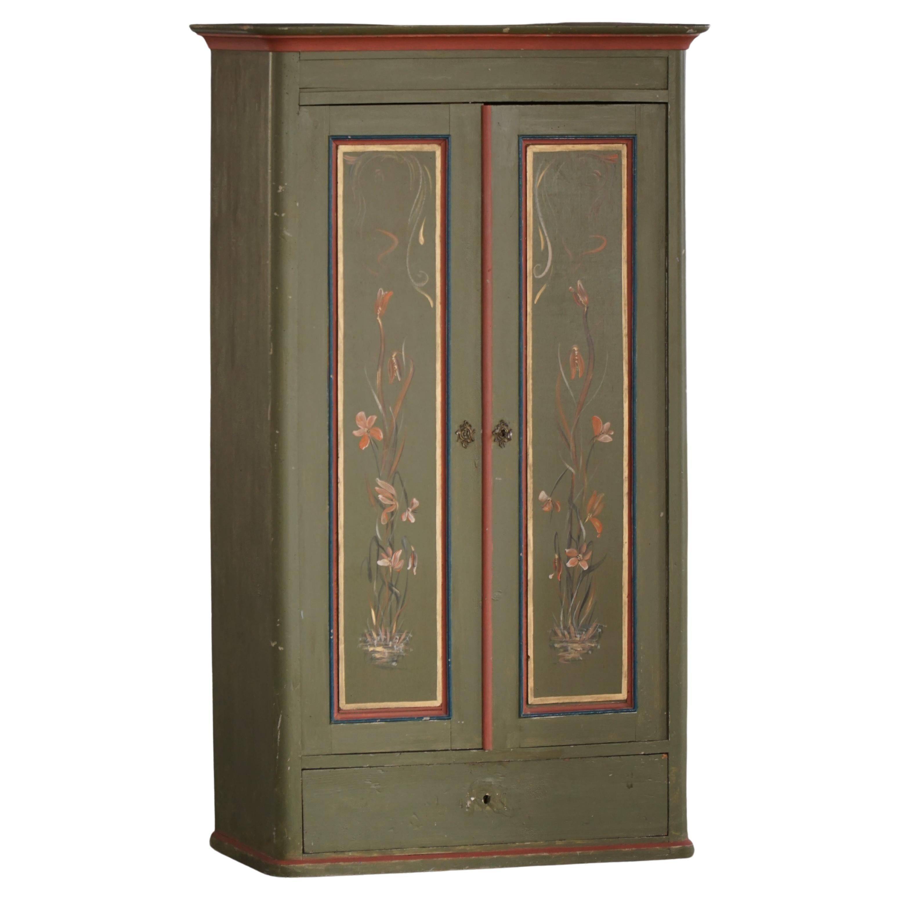 Old Danish cupboard painted with floral patterns, folk art, 19th century.