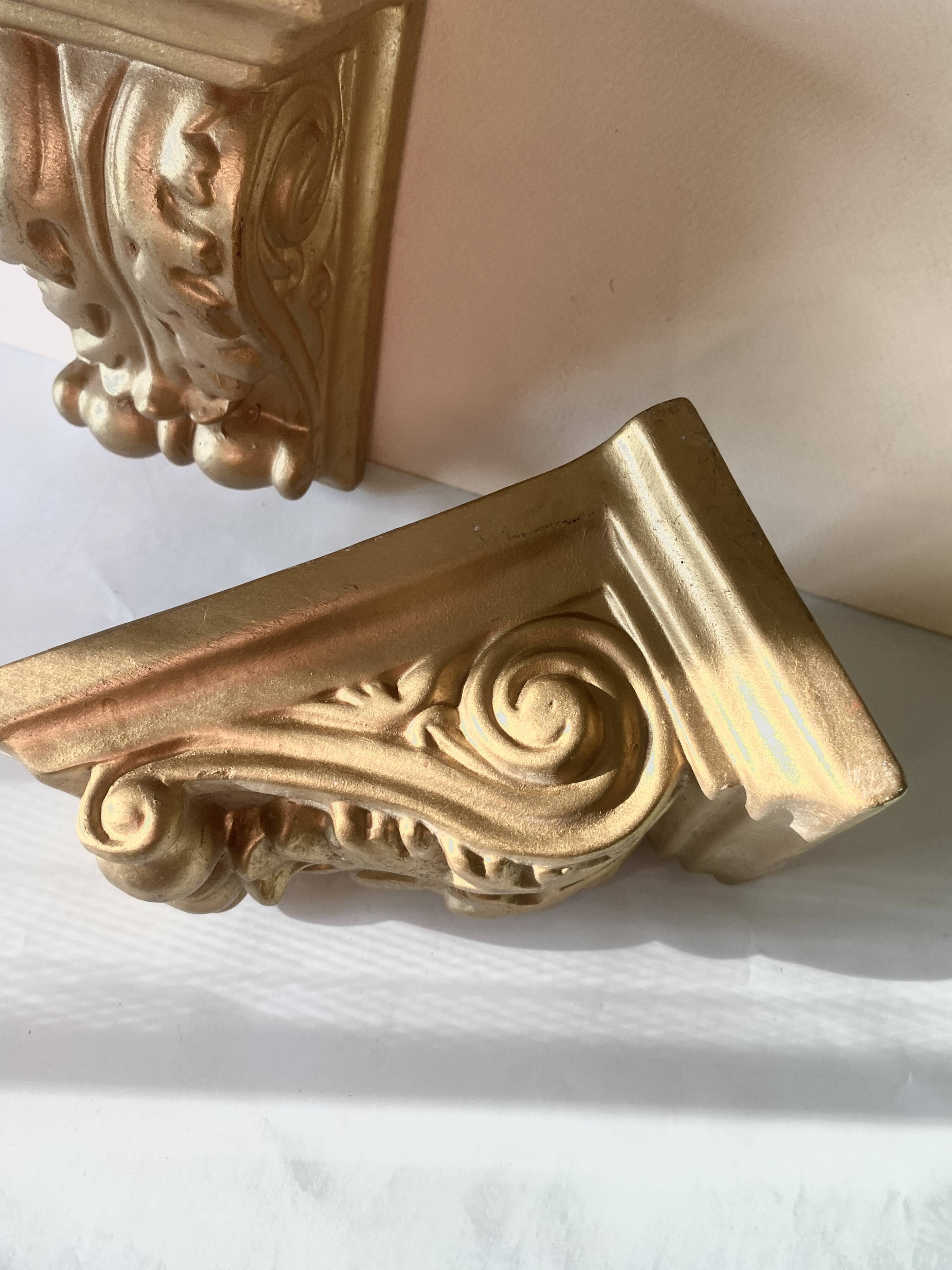 Pair of terracotta wall consoles