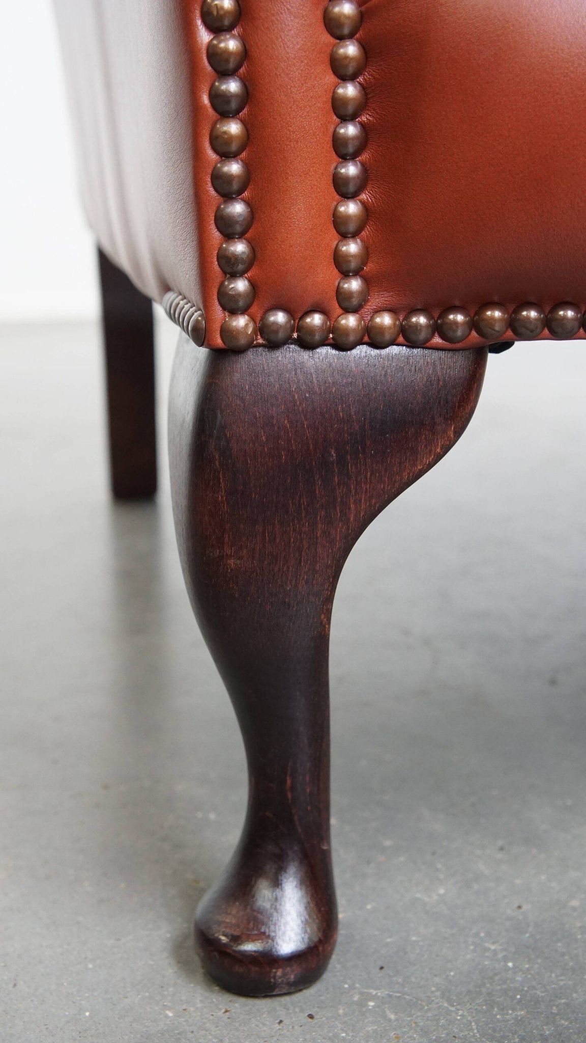 Elegant smooth English cowhide leather Chesterfield wingback armchair
