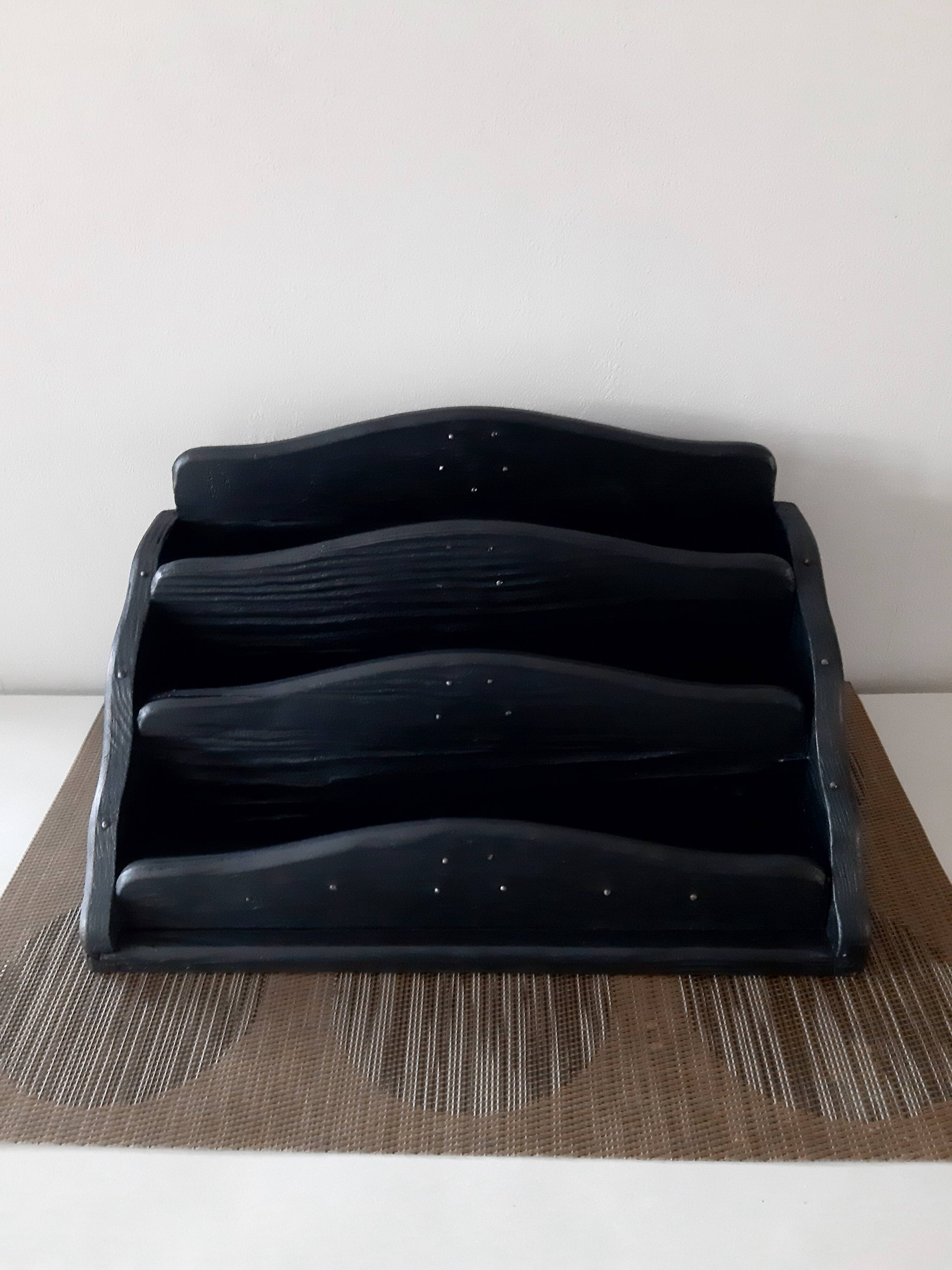 Old letter holder valued