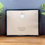 Print by Michael J. Leu – winter urban scene – framed