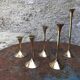 Series of 5 brass candlesticks