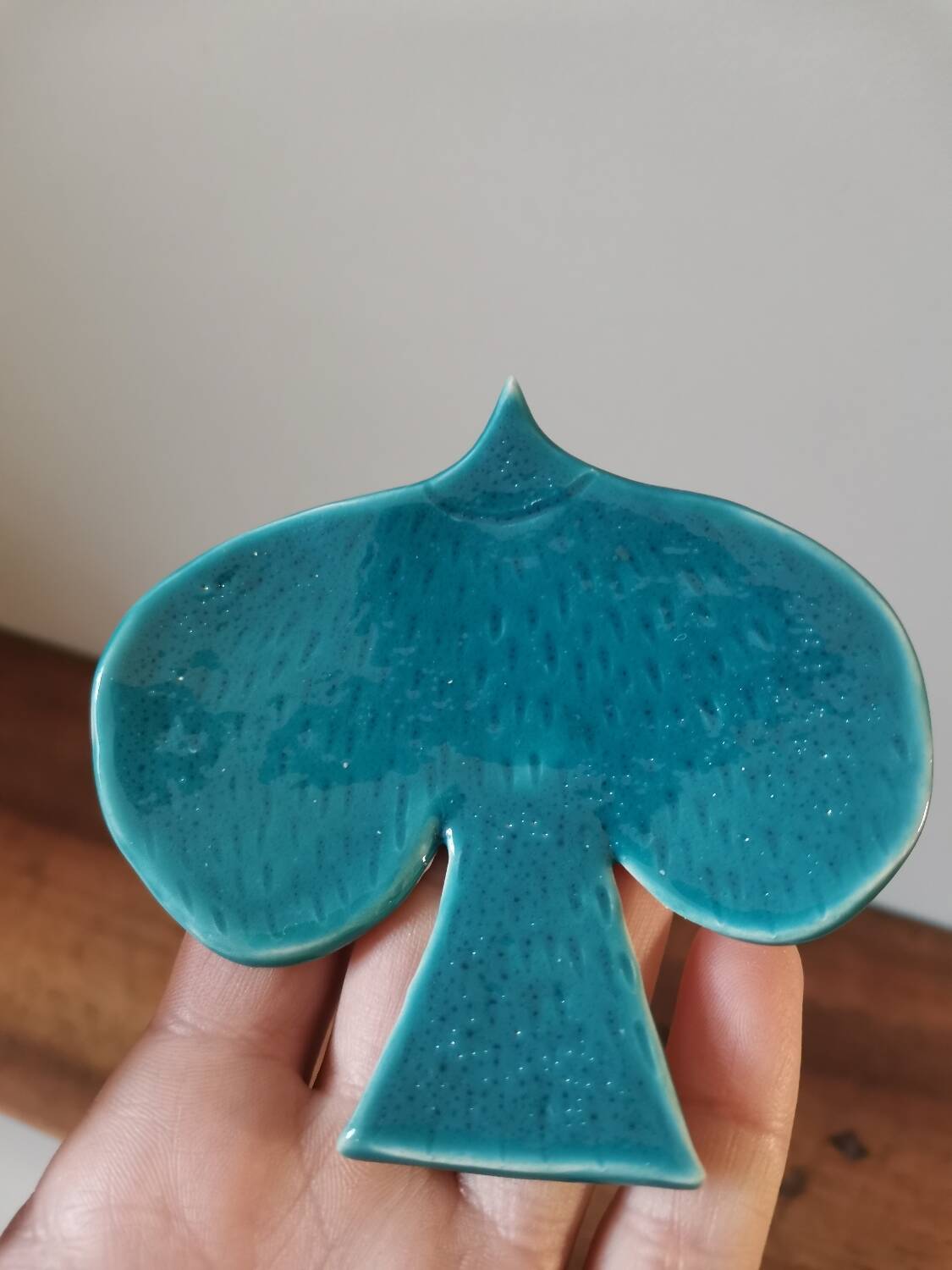 Vintage bowl in the shape of a slightly speckled blue enamelled bird