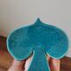 Vintage bowl in the shape of a slightly speckled blue enamelled bird