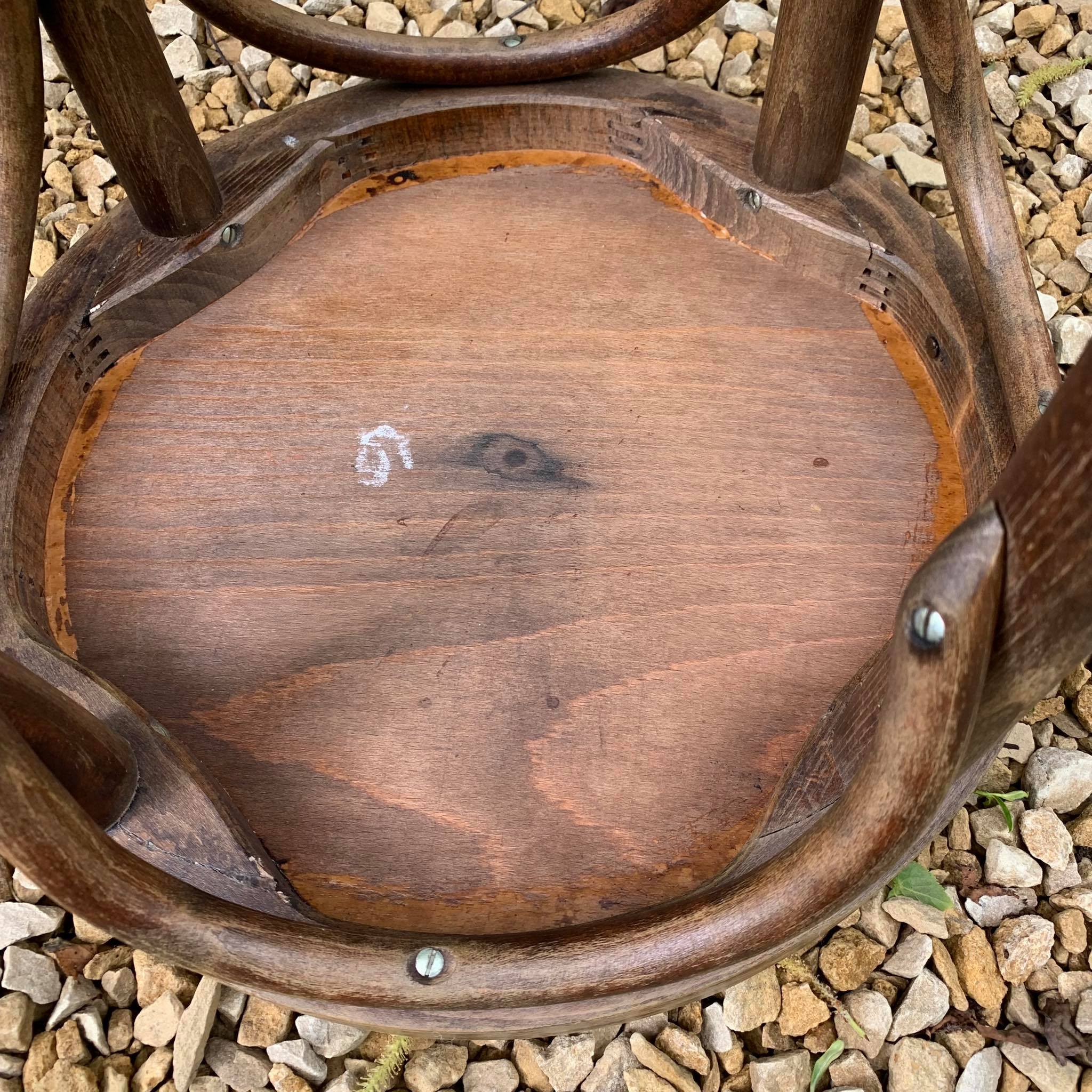 Curved wooden bistro stool