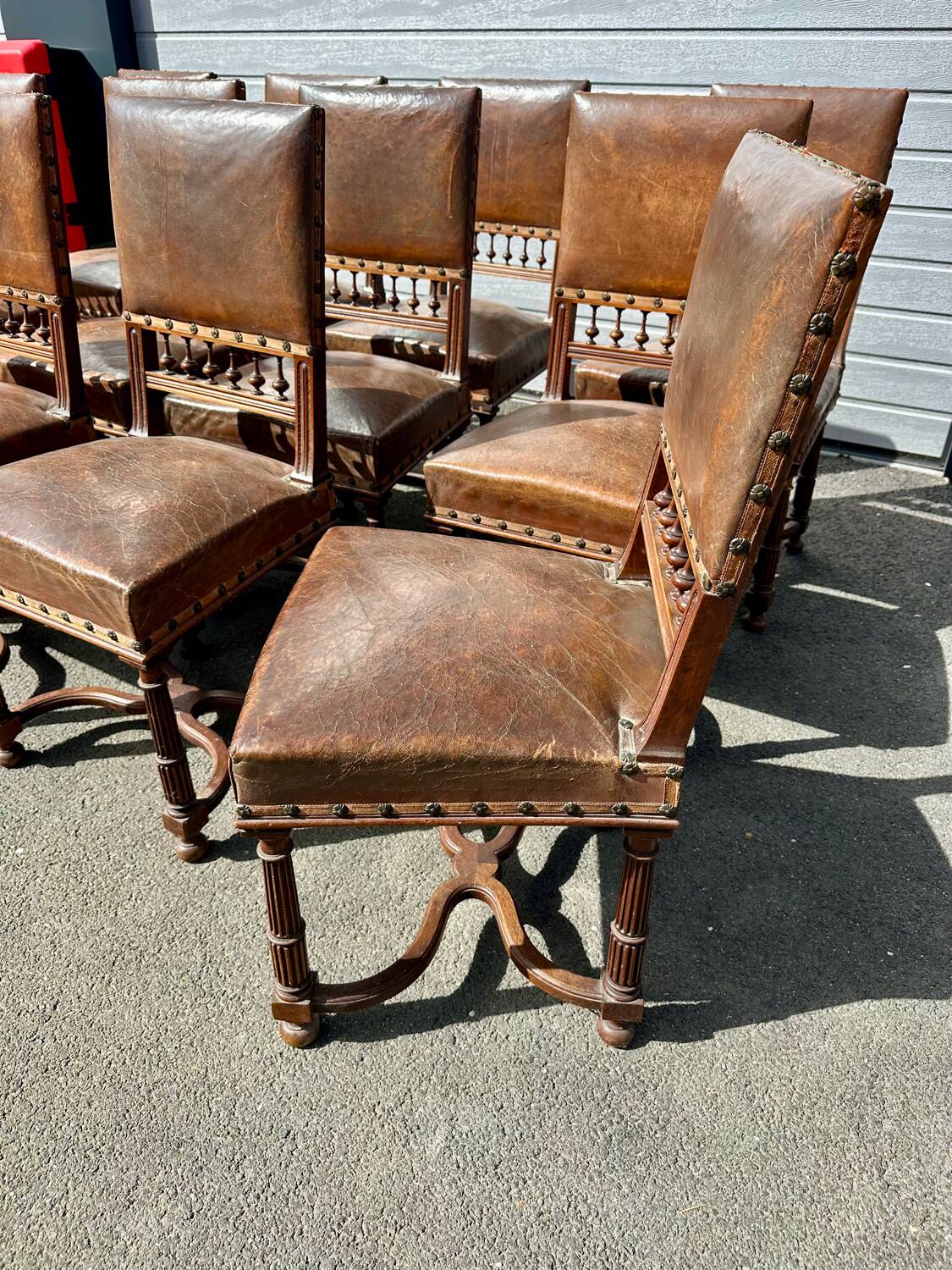 Set of 12 Henri II neo-Renaissance style walnut chairs