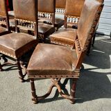 Set of 12 Henri II neo-Renaissance style chairs in walnut