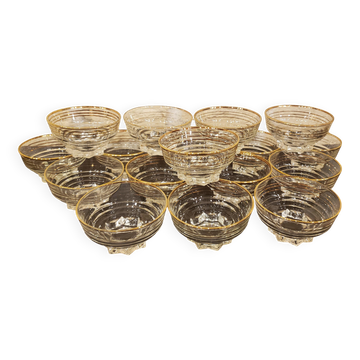 Set of 17 elegant bowls with gold rims
