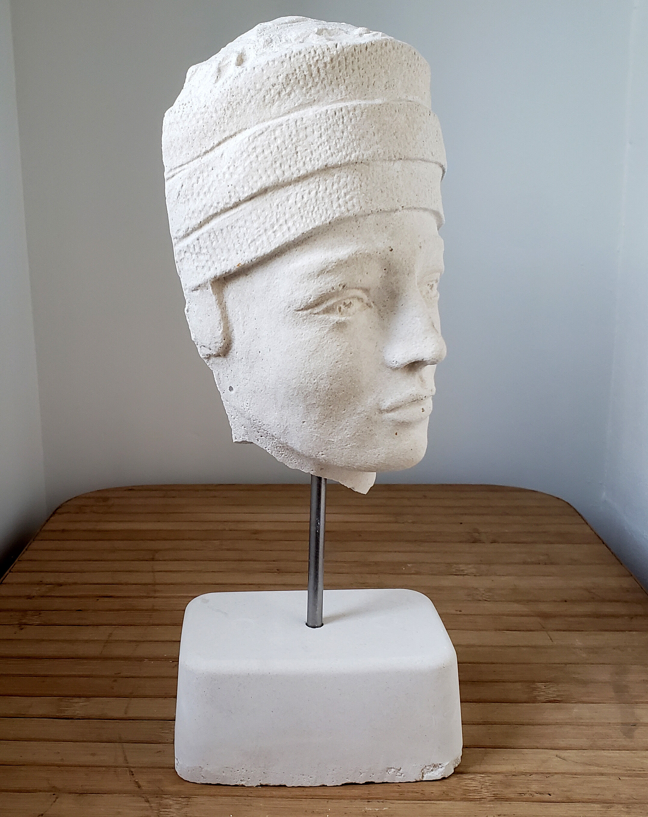 Androgynous head in plaster