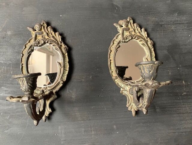 Pair of antique bronze candle holders