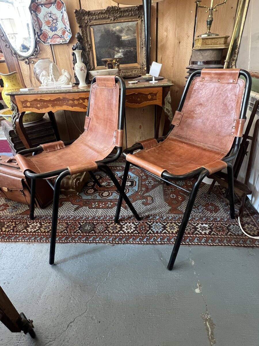 Pair of Metal and Leather Chairs, after Charlotte Perriand for Les Arcs, circa 1960.
