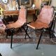 Pair of Metal and Leather Chairs, after Charlotte Perriand for Les Arcs, circa 1960.