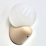 Beige Tissot wall light with opaque white glass globe, 1970s 80s.