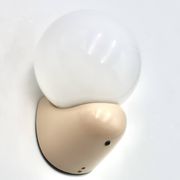 Beige Tissot wall light with opaque white glass globe, 1970s 80s.