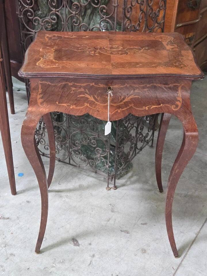 work table from the Napoleonic III era with marquetry of scrolls and patterns