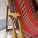 Vintage deck chair in wood and striped fabric - mid-20th century