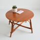 Vintage 1960s round wood and rattan coffee table