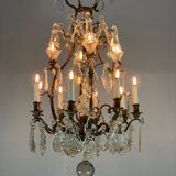 Bronze cage chandelier adorned with cut crystal pendants, 12 lights