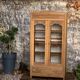 Parisian art deco glass cabinet in raw wood