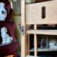 Folding bookshop shelf in light wood