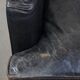 Armchair in black grained cowhide leather with a deep seat