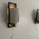 Mid-century pair of wall sconces in textured glass and brass, 1950s, Germany.