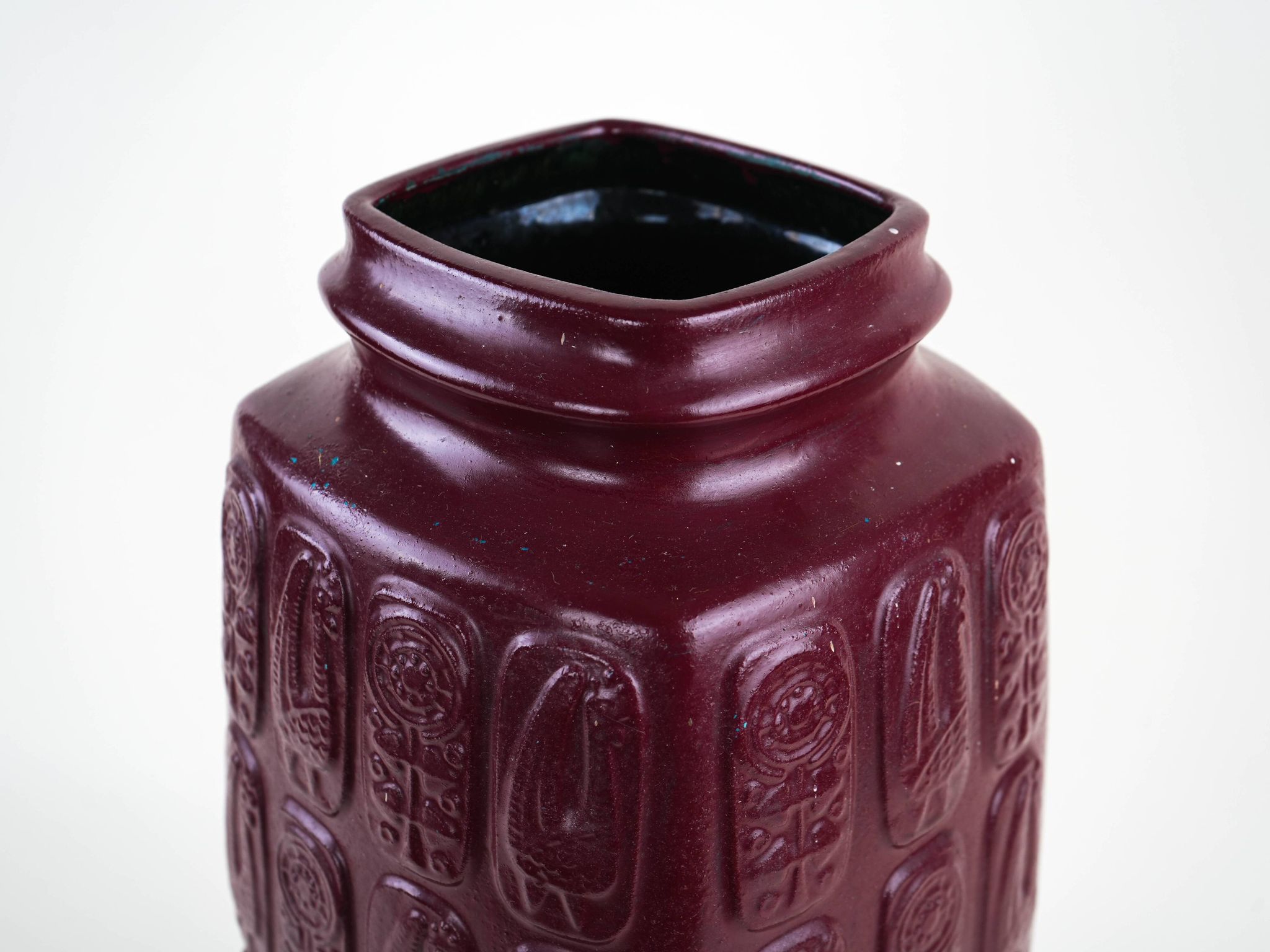 Bay Keramik ceramic vase with floral relief, burgundy glaze, Germany, 1970s