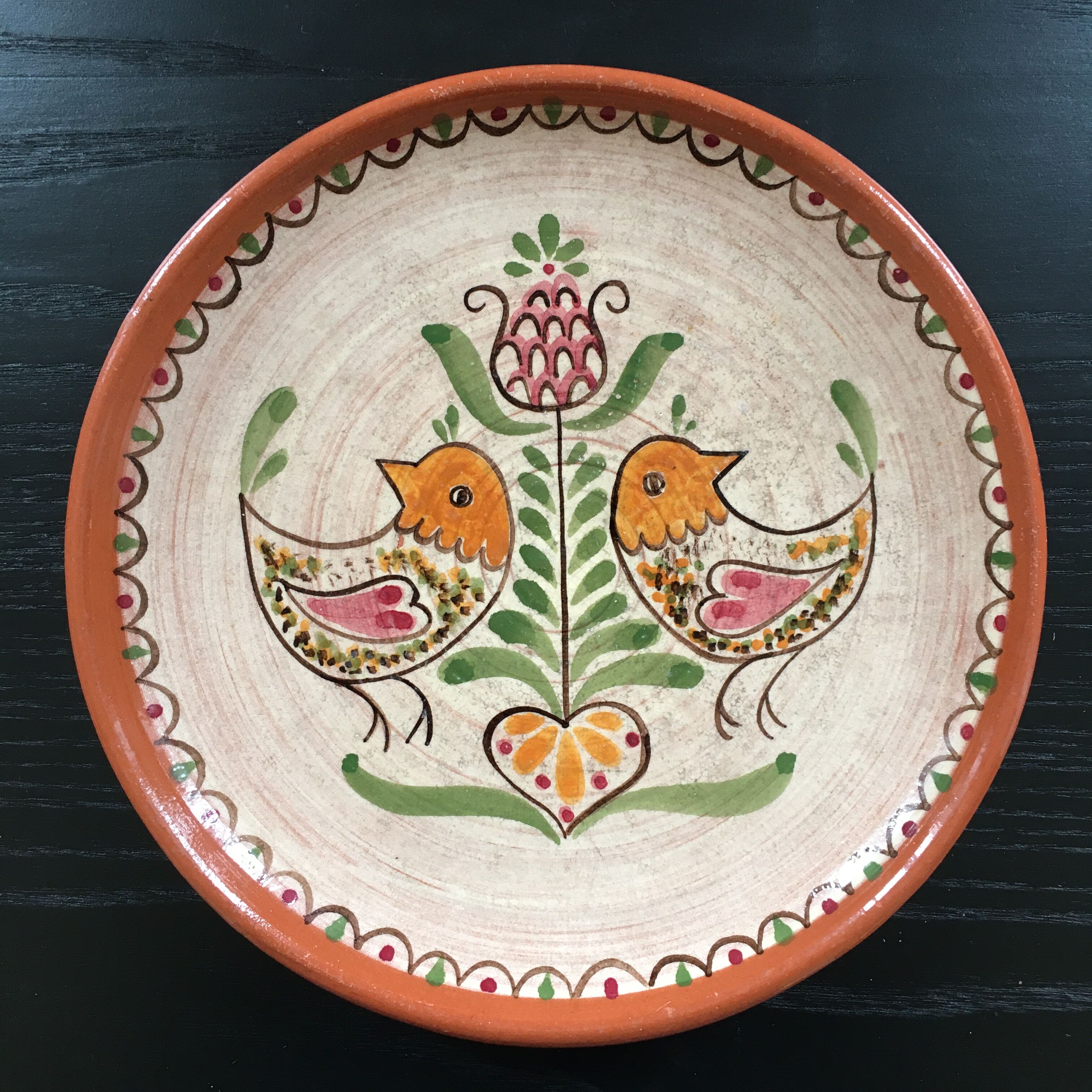 Decorative plate with birds, signed.