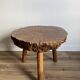 Brutalist tripod coffee table in elm burl, 1950.
