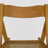 Pair of vintage folding chairs in beech and canework. Italy 70s