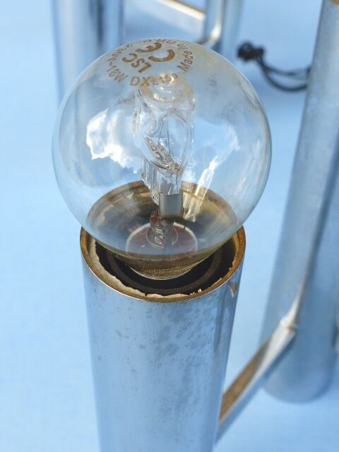 Chromed metal wall lights from Sciolari House in the 60s