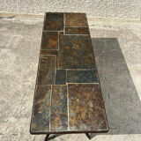 Coffee table with stone top and iron legs