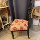 Fireplace or changing chair period 1900 in black lacquered wood and printed fabric