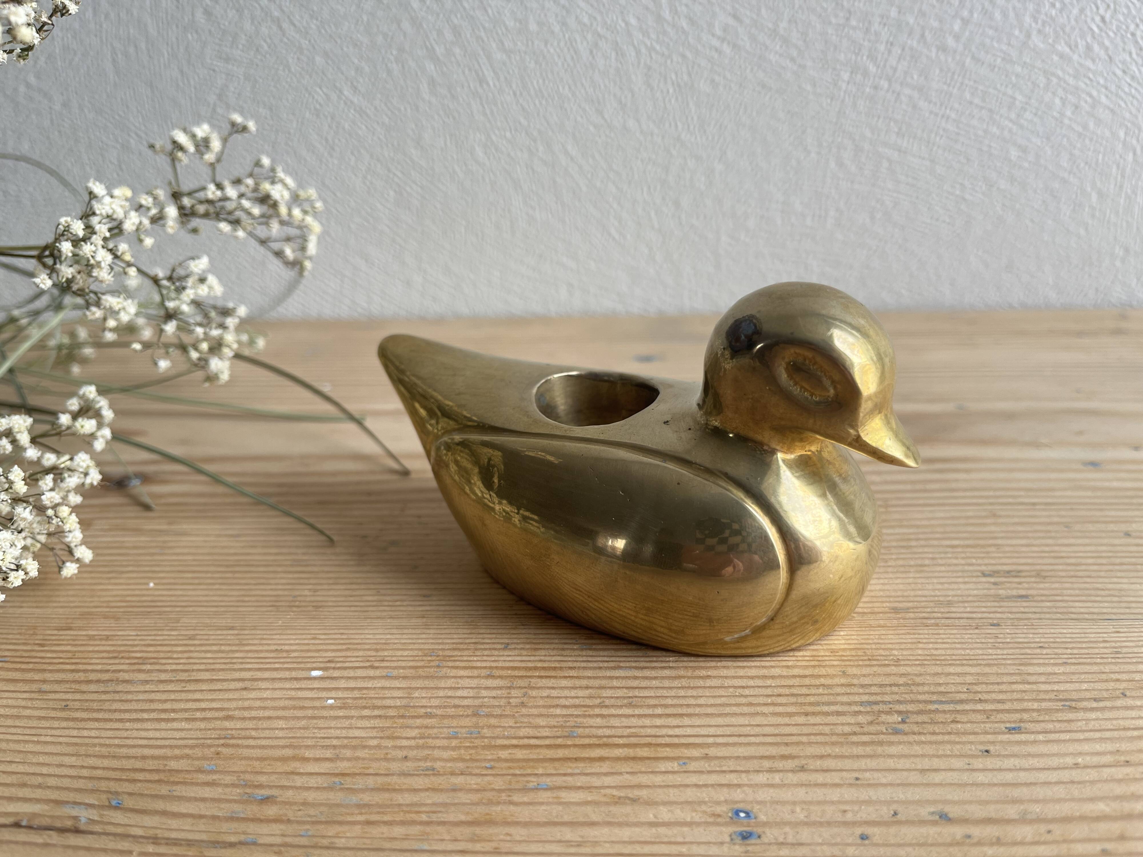 Brass duck candle holder