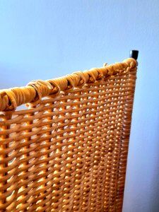 Wicker bedside table or side table from the 1960s.