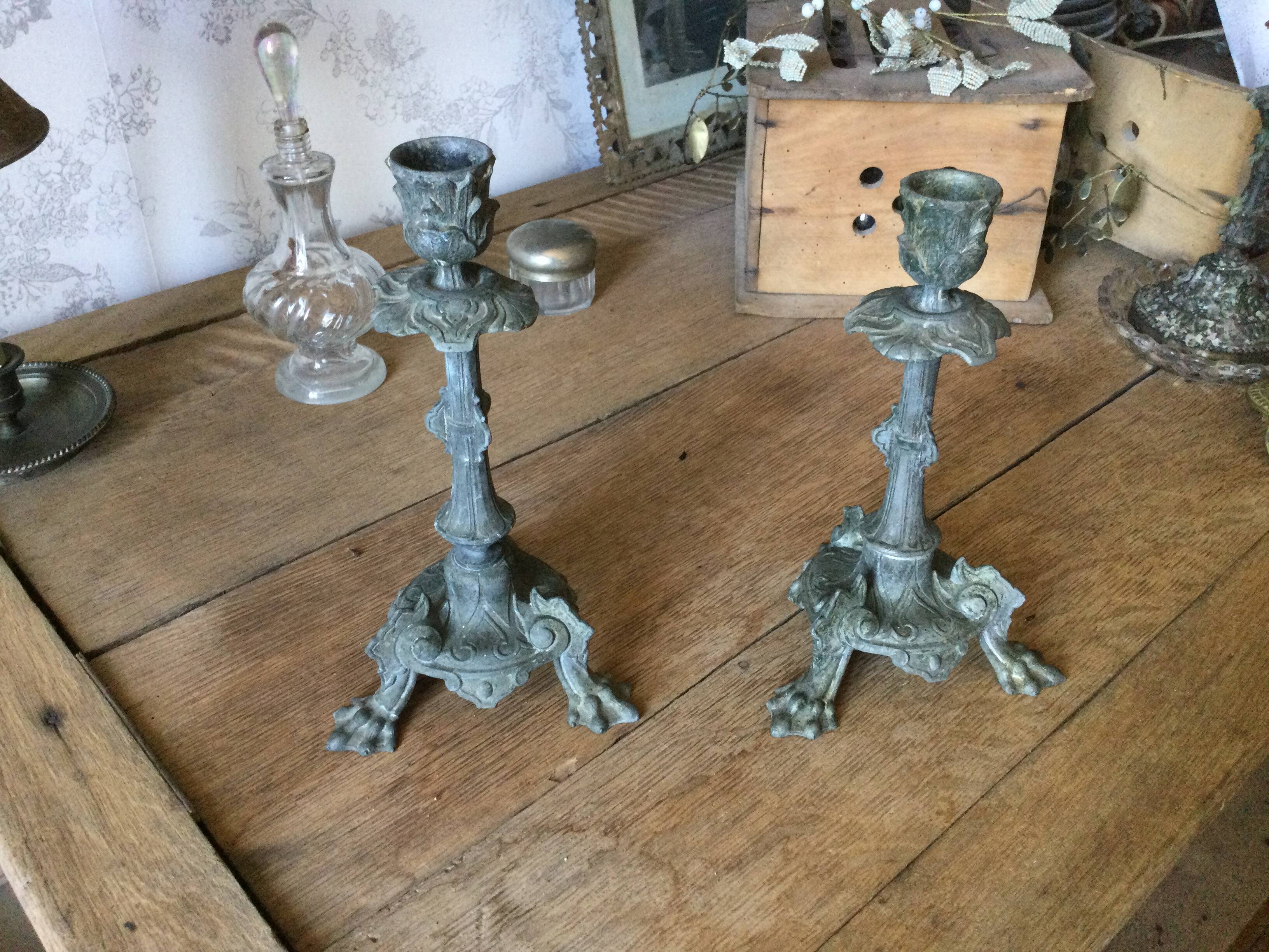 Set of 2 antique candlesticks in spelter.