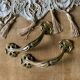 Pair of antique Art Nouveau brass handles