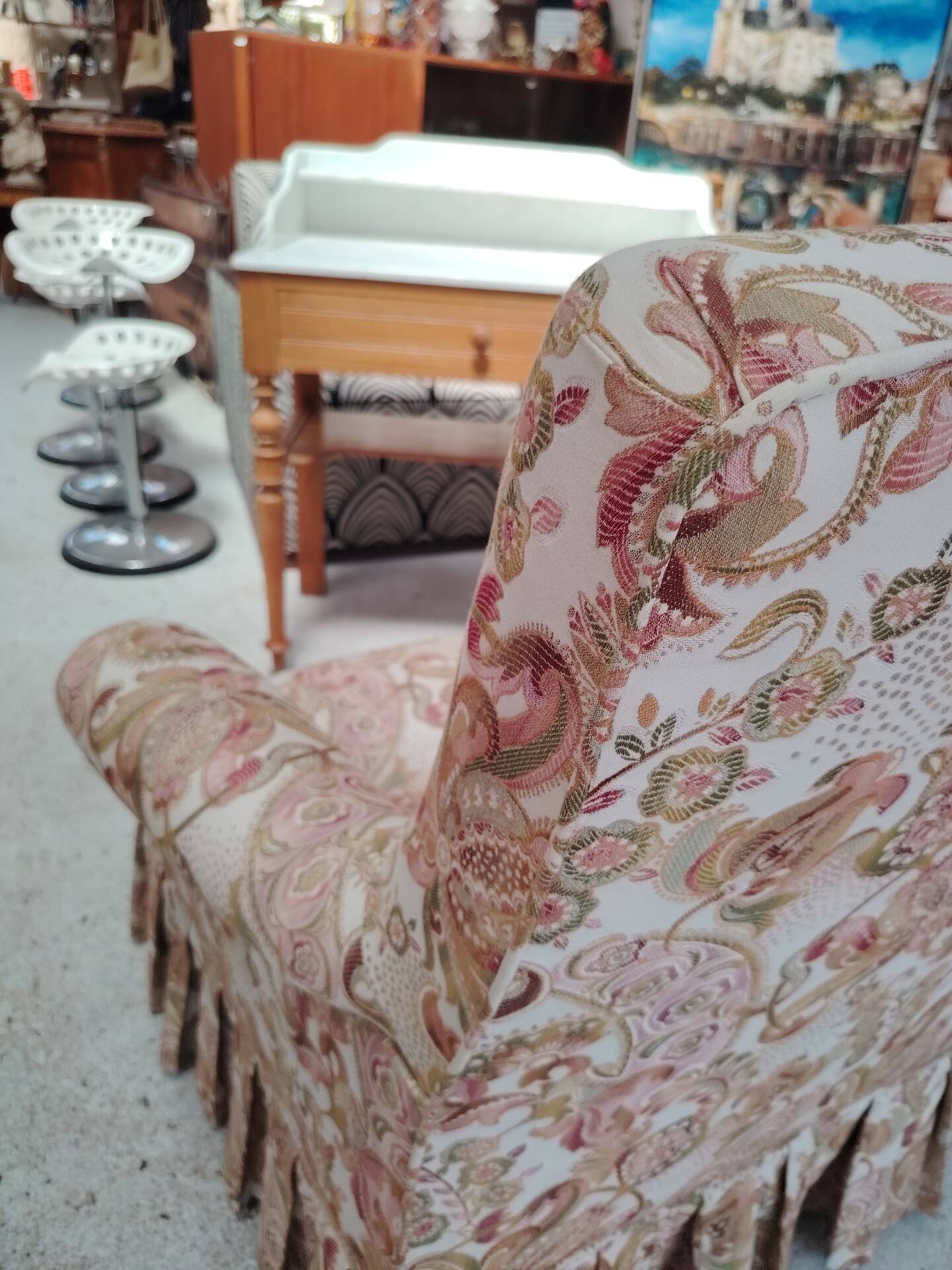 Antique armchair fully restored with brass wheels.