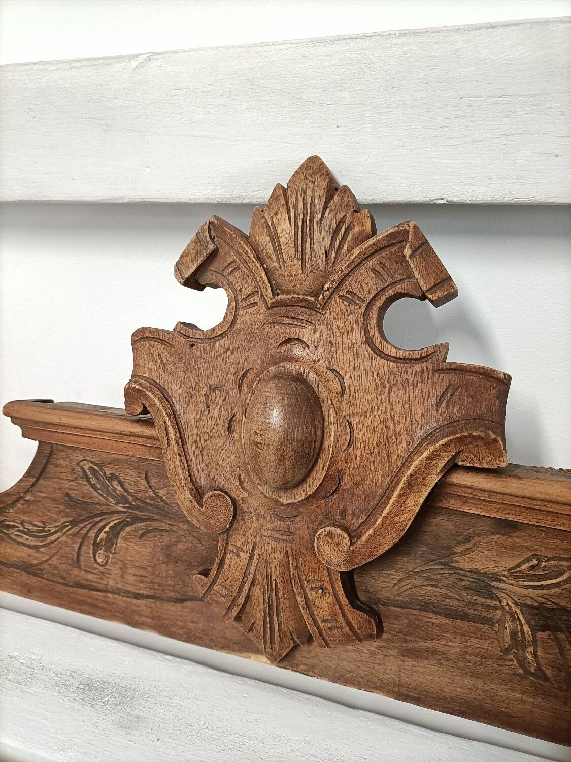 Antique carved wooden door pediment