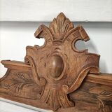 Antique carved wooden door pediment