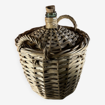 Vintage demijohn with rattan carboy