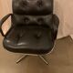 Black leather armchair by Charles Pollock for Knoll International