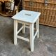 White wooden stool